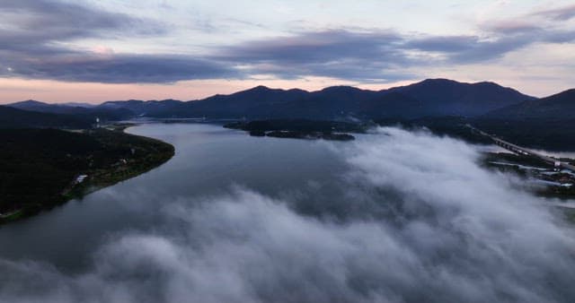 Serene river surrounded by mountains