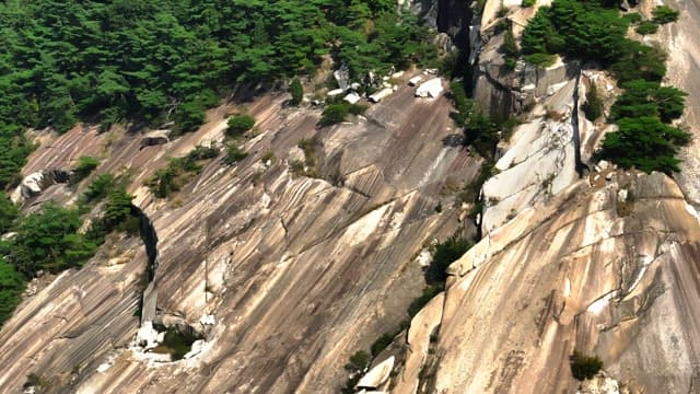 Buramsan mountain slope with lush greenery