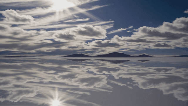 Clouds reflected in vast salt lake