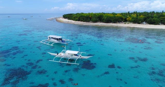 Bangcas Floating on Tropical Beach Sea