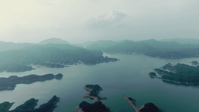 Tranquil lake surrounded by mountains