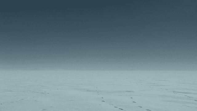 Vast snow-covered plains under clear sky
