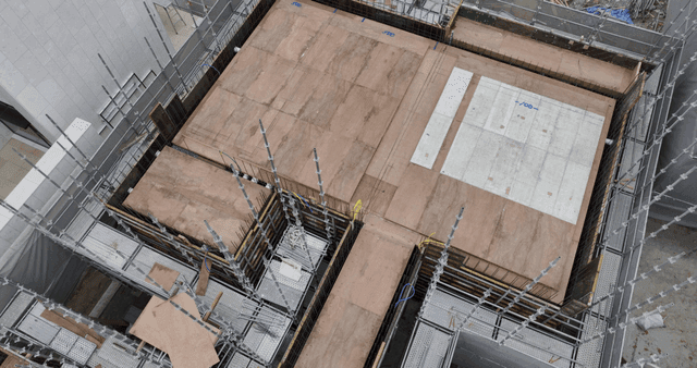 Construction site with scaffolding and workers