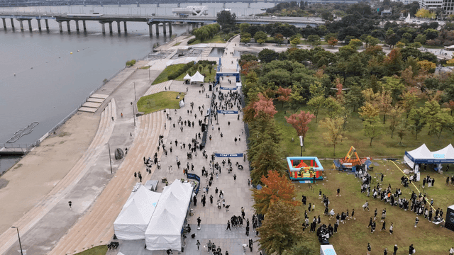 View overlooking riverside festival scene