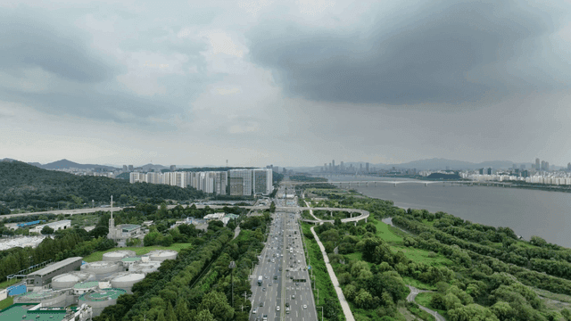 Cityscape with river and highway