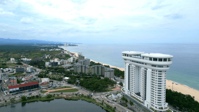 Coastal city with modern buildings and beach
