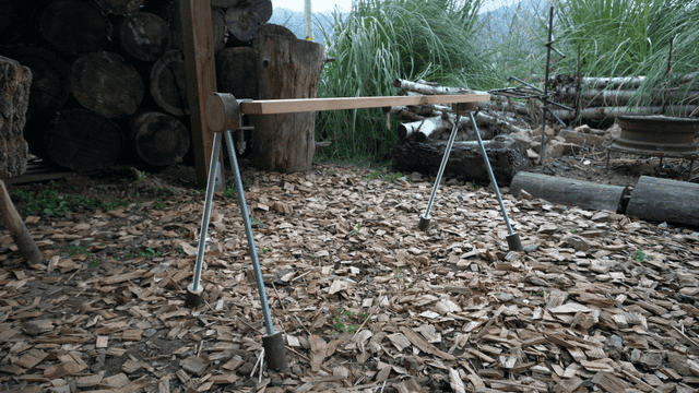 Handcrafted wooden bench in outdoor woodworking space