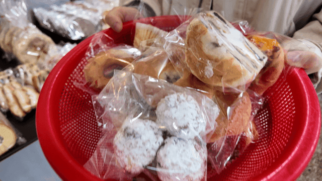 Basket of assorted packaged desserts