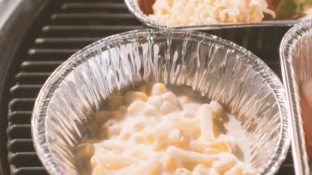 Corn cheese and ramen on a grill