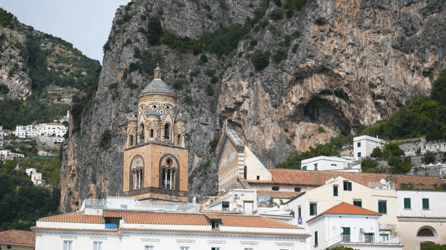 Historic building with mountain backdrop