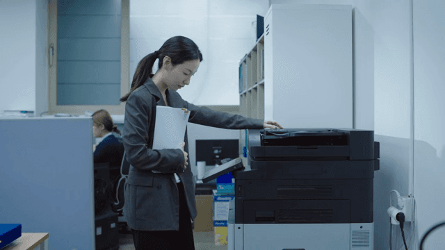 Office worker using a printer