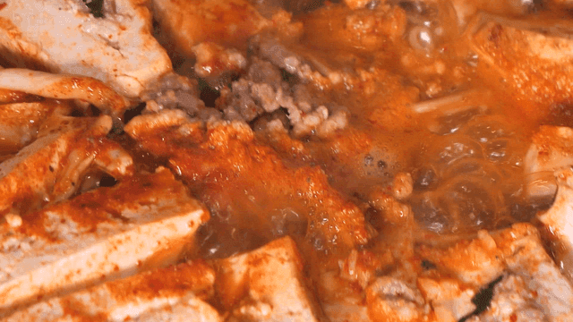 Korean tofu stew simmering with spices