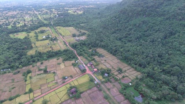 View of rural farmland and village