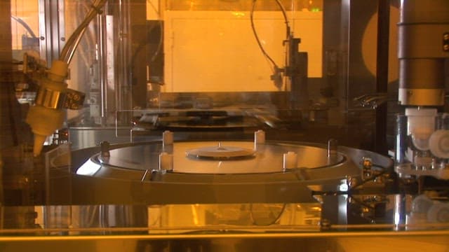 Automated machinery in a semiconductor manufacturing plant