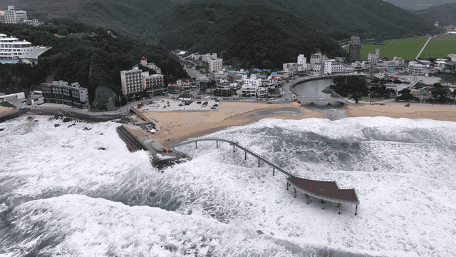 Wave-crashing sea pier observation deck