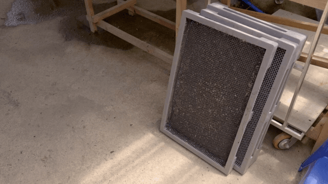 Trays on a concrete floor