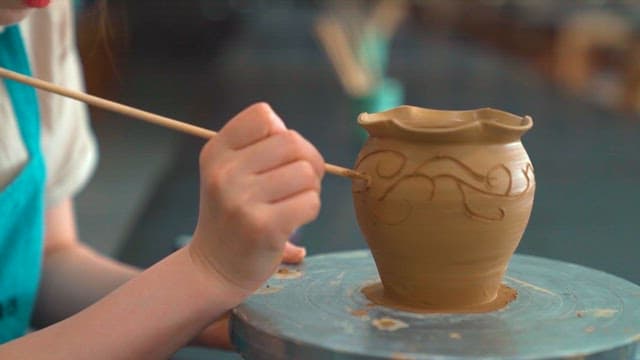 Person who Delicately Engraves Patterns on Ceramics