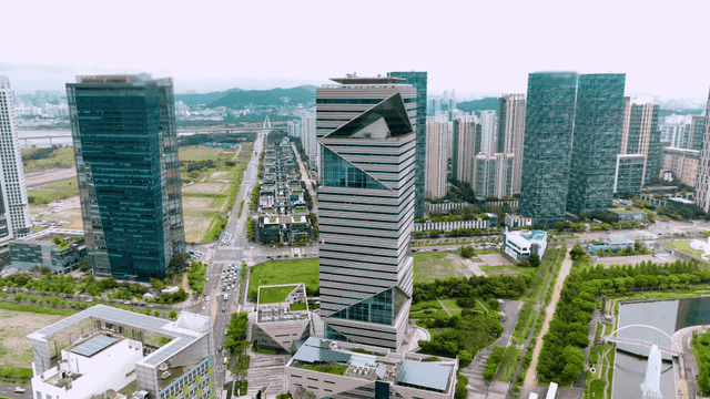 Modern skyscrapers in a green urban area