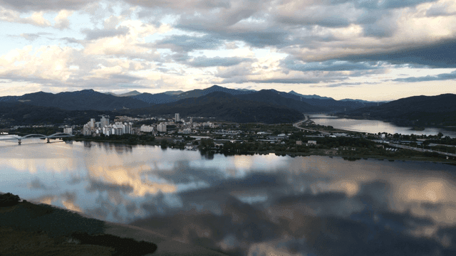 Cityscape with mountains and rivers