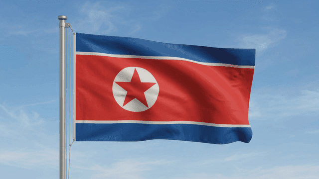 North Korean flag fluttering against clear sky