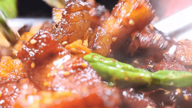 Korean barbecue sizzling with vegetables