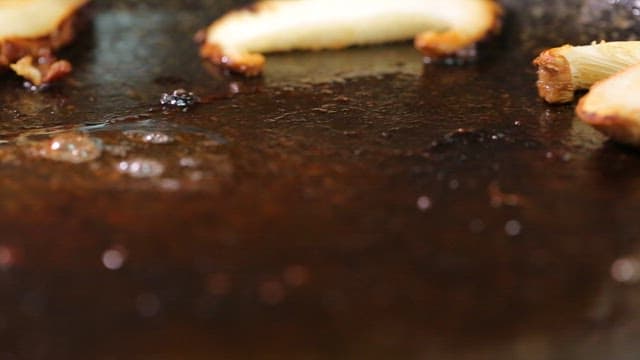Sizzling beef brisket on a grill