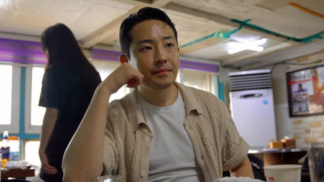 Man sitting comfortably in a restaurant