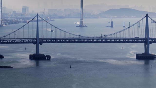 Large bridge over a calm river