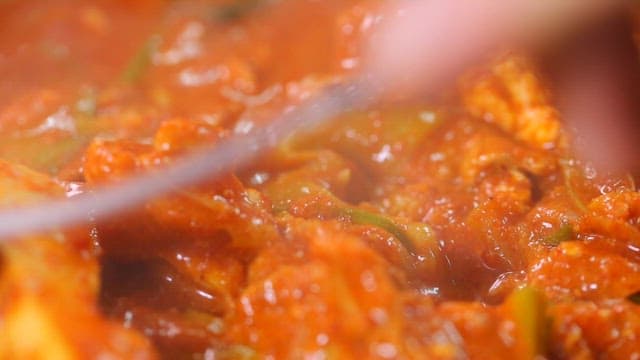 Spicy pork stew with plenty of vegetables, tofu, and meat