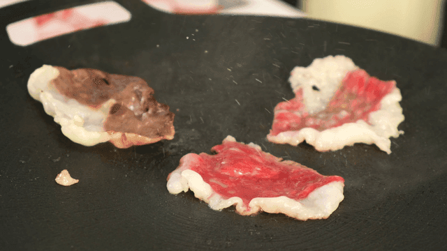 Sizzling beef chadolbagi on hot grill