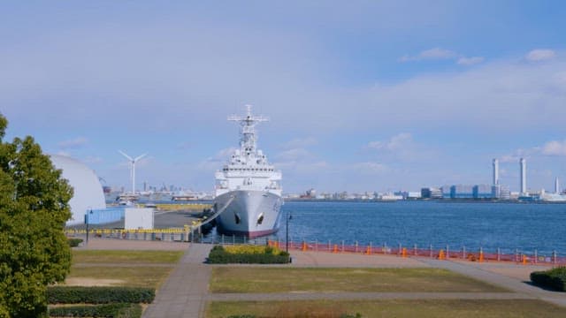 Naval Vessel Docked at Waterfront