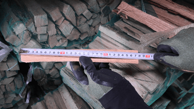 Measuring firewood with a tape measure