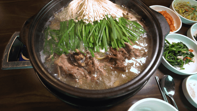 Duck stew with side dishes