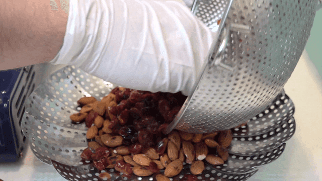 Cranberries poured over almonds