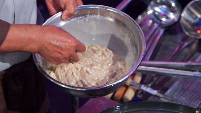 Battered pork in hot oil