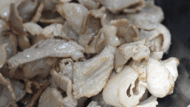 Stir-fried pork on plate