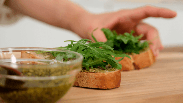Sourdough topped with fresh arugula