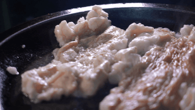 Sizzling flat intestines grilled in hot pan