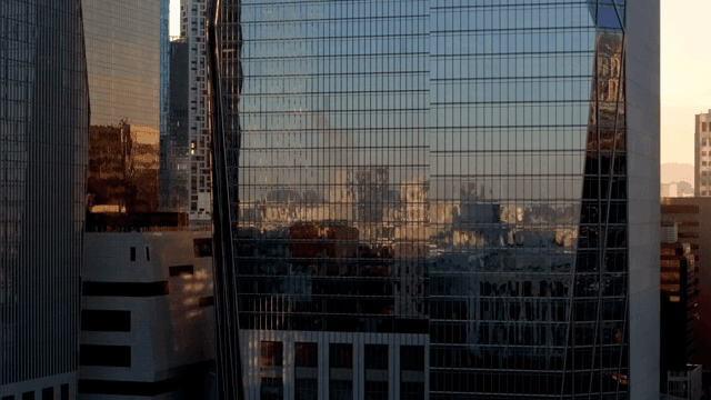 Modern skyscraper at sunset in the city