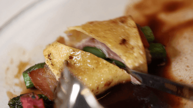 Cannelloni cut with knife and fork