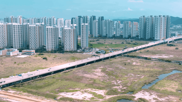 Cityscape with high-rise apartments and highways