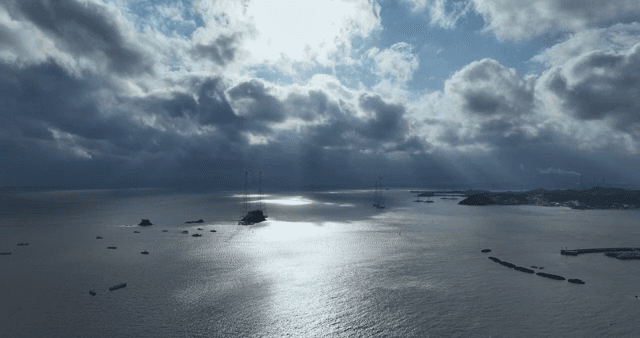 Cloudy sky over a vast ocean with islands