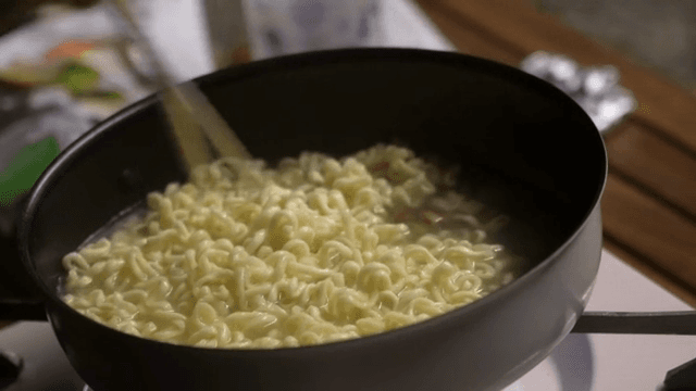 Boiling Ramyeon in a pot