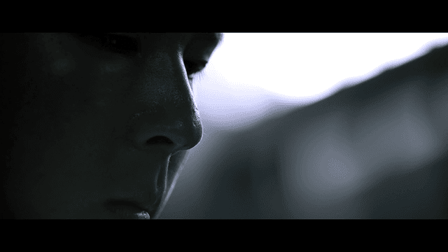 Student lost in thought in dark place