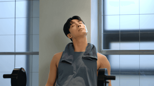 Man resting after workout in gym