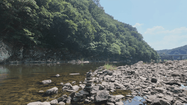 Pile of stones and quiet river