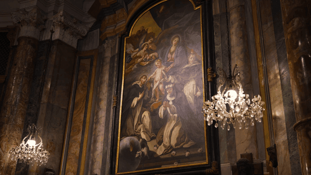 Inside cathedral with Bible paintings