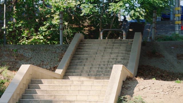 Couple walking down outdoor stairs