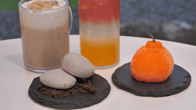 Colorful drinks and Hallabong-shaped bread desserts on table