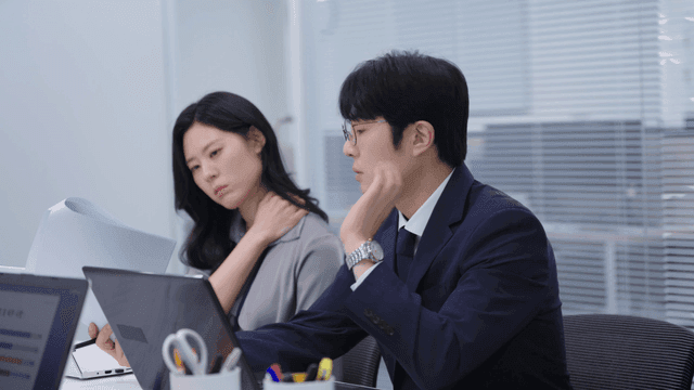 Office workers focused on their tasks